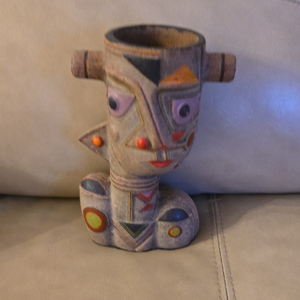 Artistic Face Sculpture with Multicolor Design